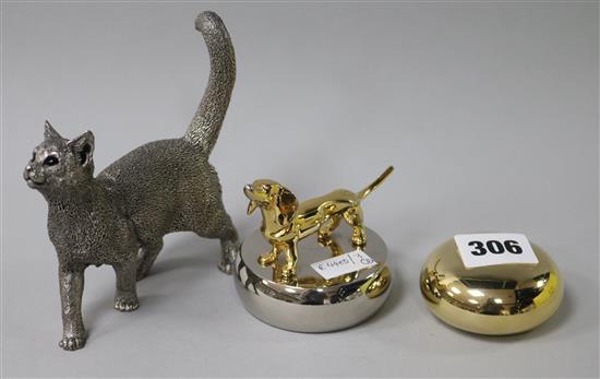 Two Aspreys paperweights and a silver model of a cat